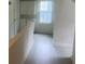 Large bonus room with kitchenette and window at 2351 Johnson Ferry Ne Rd, Chamblee, GA 30341
