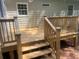 Newly stained deck with stairs and railing at 2351 Johnson Ferry Ne Rd, Chamblee, GA 30341