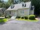 House exterior featuring a charming ranch design with well-manicured landscaping at 2351 Johnson Ferry Ne Rd, Chamblee, GA 30341