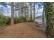 View of the backyard with a glimpse of the house and patio in the background at 3881 Bonnie Se Ln, Atlanta, GA 30354