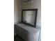 Bathroom boasts granite countertop and large mirror at 5112 Central Church Rd, Douglasville, GA 30135