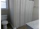 Clean bathroom with shower and patterned curtain at 5112 Central Church Rd, Douglasville, GA 30135