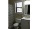 Modern bathroom with shower, toilet and vanity at 5112 Central Church Rd, Douglasville, GA 30135