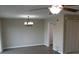 Dining area with hardwood floors, ceiling fan and chandelier at 5112 Central Church Rd, Douglasville, GA 30135