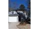 Gray two-story house with white garage door and landscaping at 5112 Central Church Rd, Douglasville, GA 30135