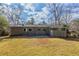 Expansive backyard with a gray patio, perfect for outdoor gatherings at 2919 Alameda Trl, Decatur, GA 30034