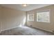 Bedroom featuring carpet flooring and natural light from the windows at 2919 Alameda Trl, Decatur, GA 30034