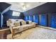 Basement with sectional sofa, blue walls, and a cozy atmosphere at 70 Finch Forest Trl, Atlanta, GA 30327