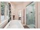 Clean bathroom with a shower and a view into the bedroom at 70 Finch Forest Trl, Atlanta, GA 30327