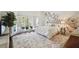 Bright bedroom with a comfy bed and a leafy wall mural at 70 Finch Forest Trl, Atlanta, GA 30327