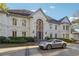 Elegant two-story home with grand entrance and manicured landscaping at 70 Finch Forest Trl, Atlanta, GA 30327