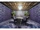 Game room with ornate ceiling and comfortable seating at 70 Finch Forest Trl, Atlanta, GA 30327