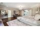 Large main bedroom with sitting area and plush carpeting at 70 Finch Forest Trl, Atlanta, GA 30327