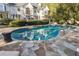 Inviting kidney-shaped pool with flagstone patio at 70 Finch Forest Trl, Atlanta, GA 30327