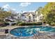 Inviting swimming pool with flagstone patio and lush landscaping at 70 Finch Forest Trl, Atlanta, GA 30327