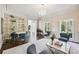 Spacious sitting area featuring comfortable seating and natural light at 70 Finch Forest Trl, Atlanta, GA 30327