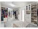 Spacious walk-in closet with ample shelving and hanging space at 70 Finch Forest Trl, Atlanta, GA 30327
