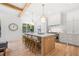 Spacious kitchen with island, stainless steel appliances, and hardwood floors at 1211 Stephens Se St, Smyrna, GA 30080