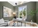 Home office with large window, modern desk, and green walls at 1211 Stephens Se St, Smyrna, GA 30080