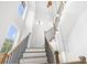 Elegant staircase with modern light fixture and railing at 1211 Stephens Se St, Smyrna, GA 30080