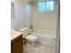 Clean bathroom with a bathtub and tiled walls at 158 Scarsdale Dr, Riverdale, GA 30274