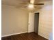Bright bedroom with wood-look floors and updated wall features at 158 Scarsdale Dr, Riverdale, GA 30274