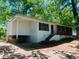 Ranch-style home with brick and white siding at 158 Scarsdale Dr, Riverdale, GA 30274