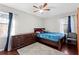 Comfortable bedroom with hardwood floors and dresser at 6625 Imperial Dr, Morrow, GA 30260