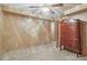 Well-lit room with neutral walls, carpet, and dresser; perfect for relaxation at 959 Cedar Falls Sw Ct, Lilburn, GA 30047