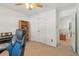 Bedroom featuring neutral walls, carpet flooring, and modern ceiling fan at 959 Cedar Falls Sw Ct, Lilburn, GA 30047