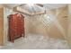 Well-lit room with neutral walls, carpet, and dresser; perfect for relaxation at 959 Cedar Falls Sw Ct, Lilburn, GA 30047