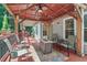 Well-appointed deck featuring comfortable seating, an outdoor grill, and a tranquil ambiance at 959 Cedar Falls Sw Ct, Lilburn, GA 30047