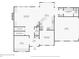 First floor plan featuring kitchen, living room, dining room, laundry room, office, and a garage at 959 Cedar Falls Sw Ct, Lilburn, GA 30047