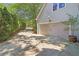 Home with a well-maintained driveway and a two-car garage at 959 Cedar Falls Sw Ct, Lilburn, GA 30047