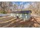 View of the back of the home, showing light-green siding and access to the backyard at 2366 Forrest Park Se Rd, Atlanta, GA 30315