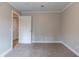 Bedroom with neutral paint, carpeted floor and entry door visible at 2366 Forrest Park Se Rd, Atlanta, GA 30315