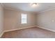 Bedroom featuring neutral walls and carpet with a window view at 2366 Forrest Park Se Rd, Atlanta, GA 30315