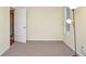 Bedroom featuring neutral walls and carpeting and two windows providing natural light at 5084 Brittany Dr, Stone Mountain, GA 30083