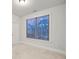 Bedroom with large window and neutral decor at 554 Lance View Ln, Lawrenceville, GA 30045