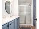 Bathroom with double vanity and shower at 830 Montego Sw Way, Lilburn, GA 30047