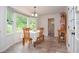 Charming breakfast nook with bay window and natural lighting at 830 Montego Sw Way, Lilburn, GA 30047