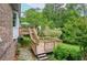 A two-level back deck provides plenty of space for relaxing and entertaining at 830 Montego Sw Way, Lilburn, GA 30047