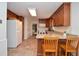 Spacious kitchen with granite countertops, wood cabinets, and modern appliances at 830 Montego Sw Way, Lilburn, GA 30047