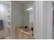 Bathroom features vanity, mirror, shelving, and storage at 250 Park Avenue West Nw # 903, Atlanta, GA 30313
