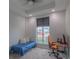 Bedroom has a large window and desk space at 250 Park Avenue West Nw # 903, Atlanta, GA 30313