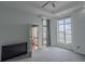 Bright bedroom with large windows and a private balcony at 250 Park Avenue West Nw # 903, Atlanta, GA 30313