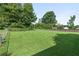 Large fenced backyard with expansive green lawn at 2685 Mars Hill Church Nw Rd, Acworth, GA 30101