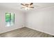 Bright bedroom with ceiling fan and updated flooring at 2685 Mars Hill Church Nw Rd, Acworth, GA 30101