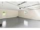 Large garage with epoxy floor and automatic garage door at 2685 Mars Hill Church Nw Rd, Acworth, GA 30101