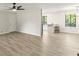 Open living space with kitchen views, wood-look floors and shiplap walls at 2685 Mars Hill Church Nw Rd, Acworth, GA 30101